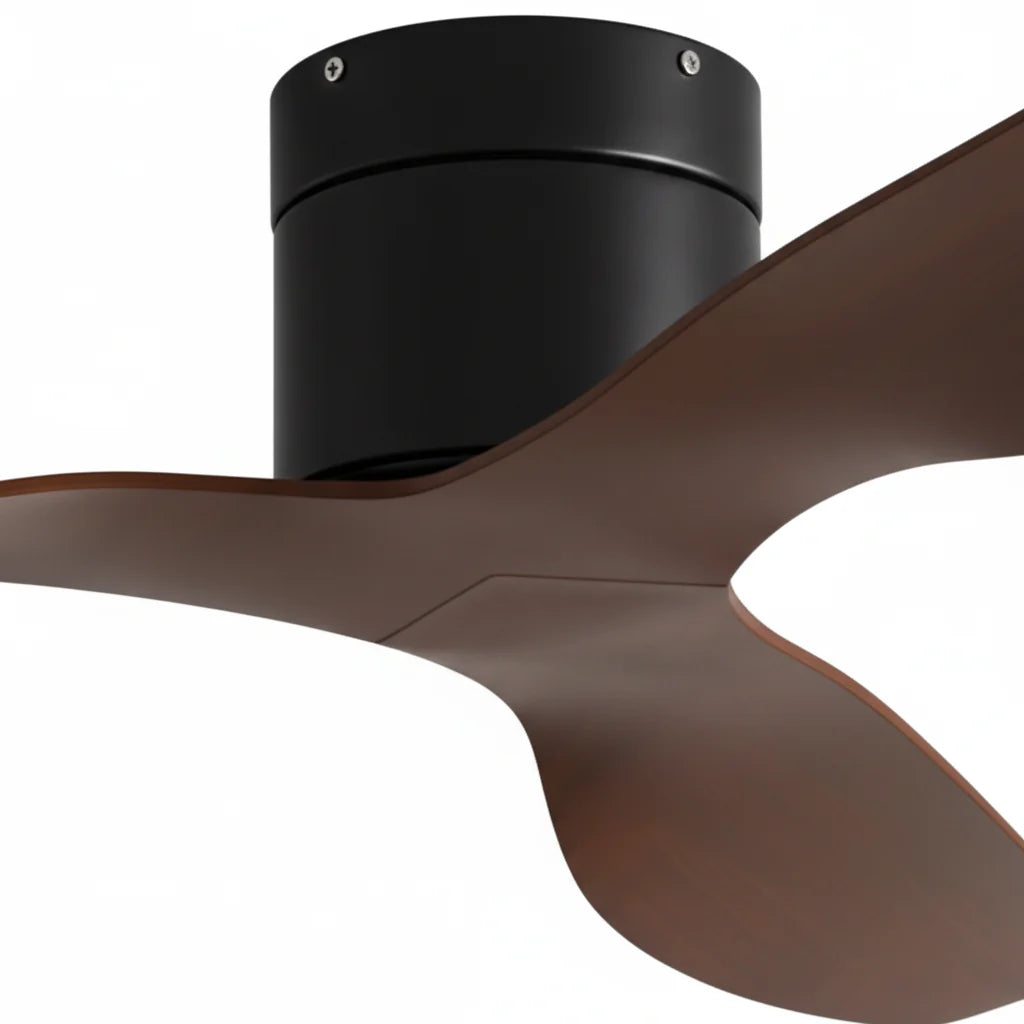Close-up of the matte black housing where the dark walnut blades meet