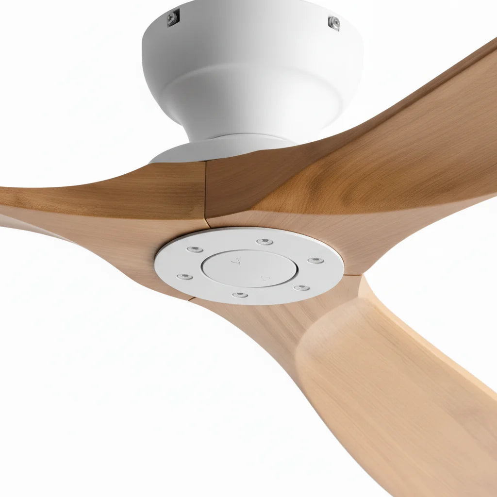 The white motor housing where the three oak blades meet