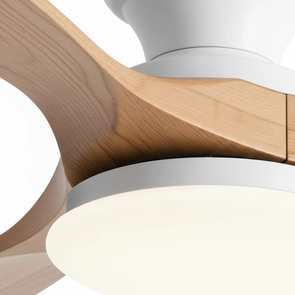 The oak blade meeting the white housing, with the light lit