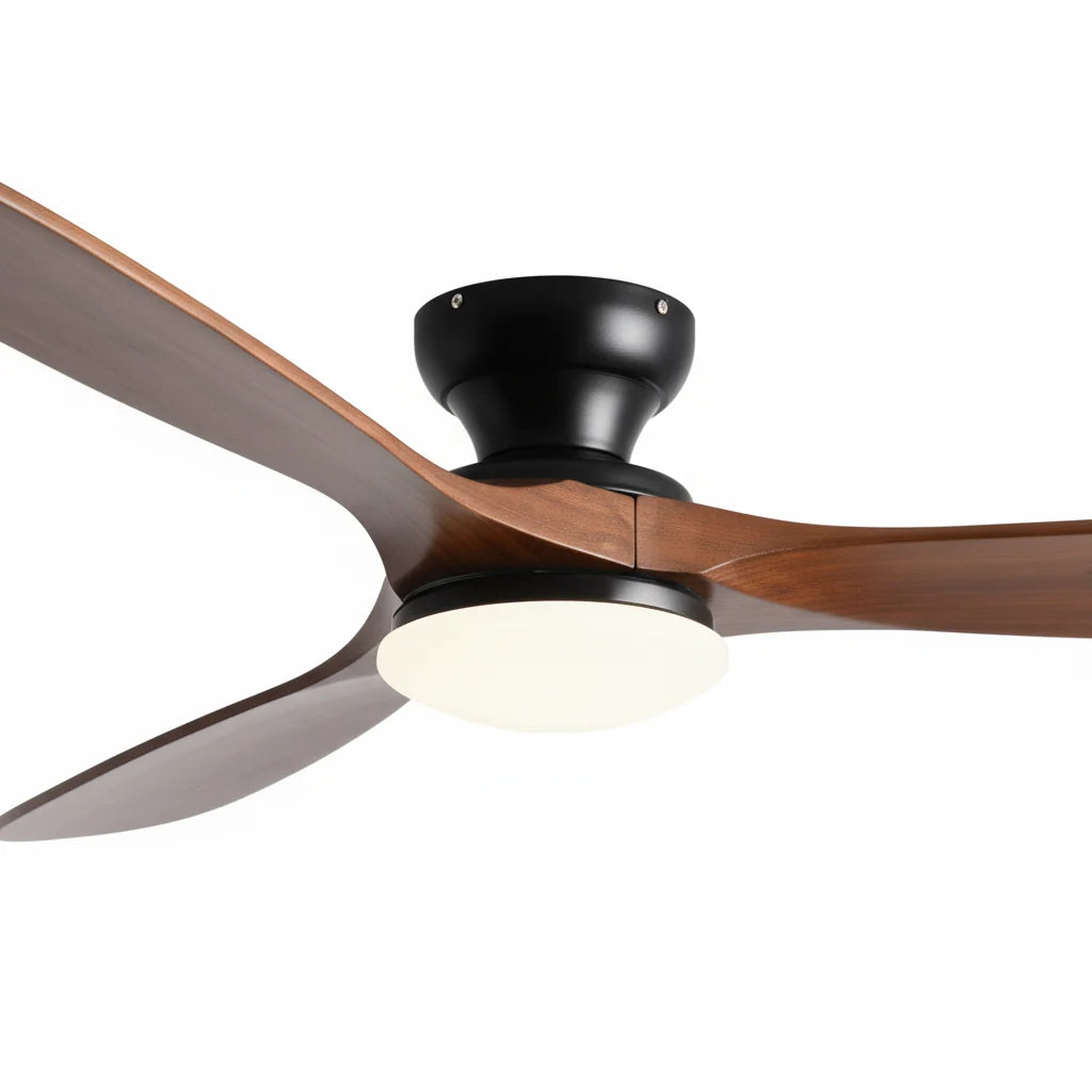 The walnut blade meeting the black housing, with the light lit