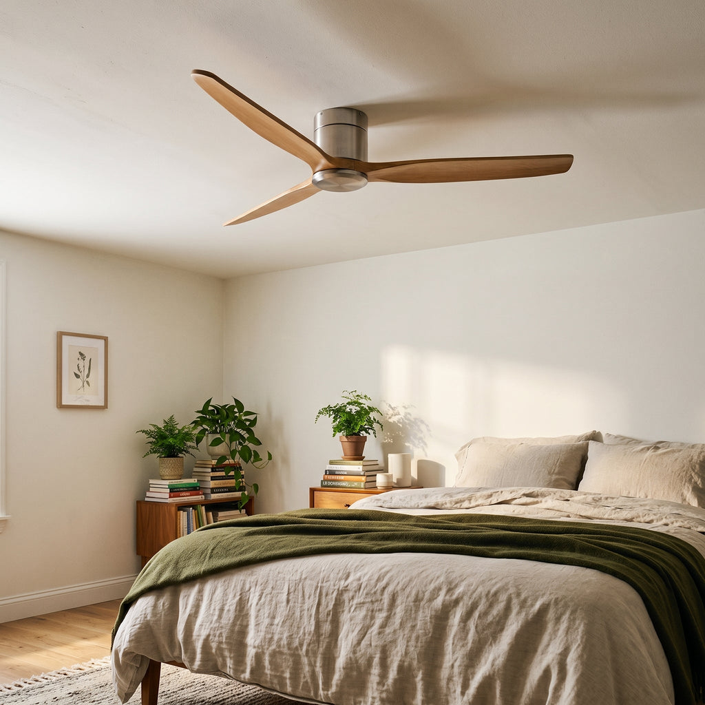 Bozeman ceiling fan in natural oak and brushed silver above a bed