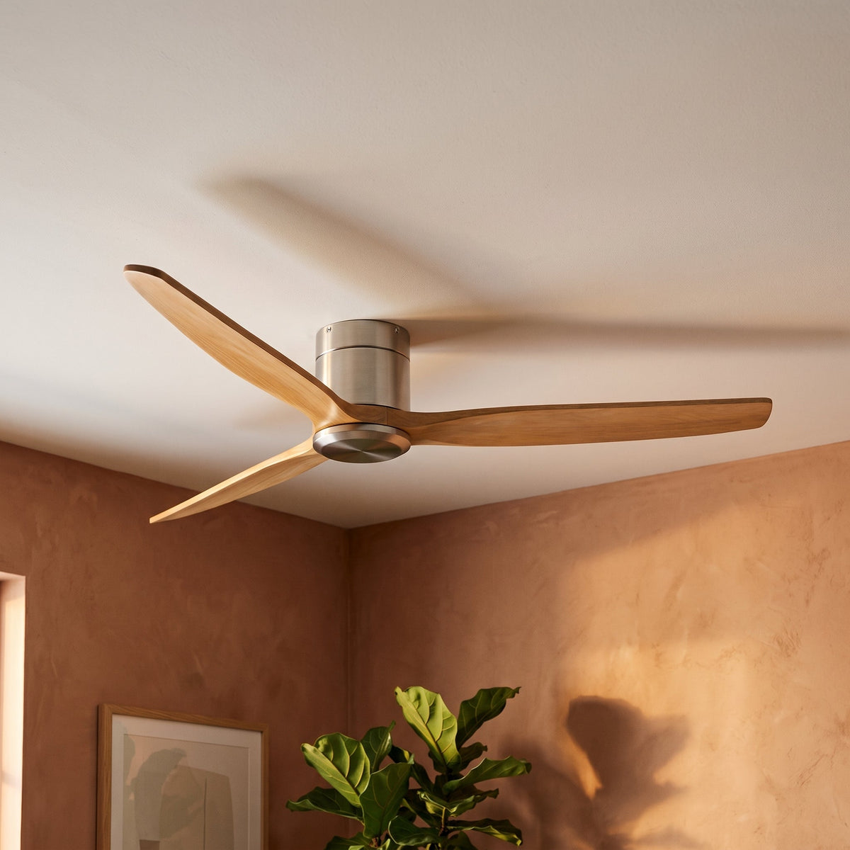 Bozeman ceiling fan seen from below against a warm wall