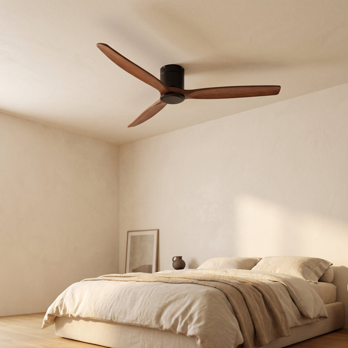 Bozeman ceiling fan in walnut and matte black above a bed