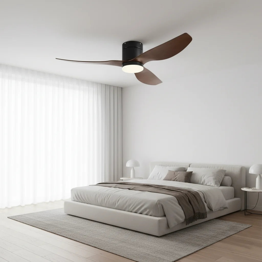 Marlow ceiling fan with its light on in a bedroom